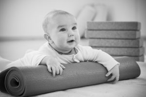 Baby on a yoga mat